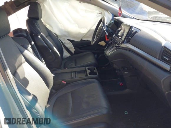 2023 Honda Odyssey Touring with VIN 5FNRL6H84PB005208, listed as a IAAI auction lot 41374452 with 60,288 mi miles and . Bid and sale history available at DreamBid. Image 5.