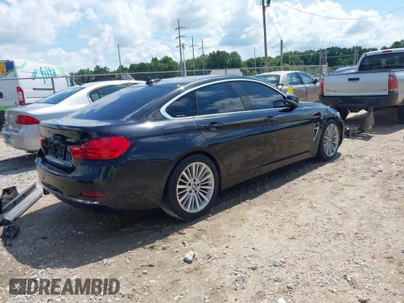 2015 BMW 4 Series 428i с VIN WBA4A5C51FG052589, выставлен на аукционе IAAI как лот 42354325 с пробегом Не указан миль и . История ставок и продаж доступна на DreamBid. Изображение 4.