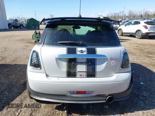 2013 MINI Cooper Hardtop with VIN WMWSU3C56DT683555, listed as a IAAI auction lot 41871323 with 102,527 mi miles. Bid and sale history available at carsss.com. Image 16.
