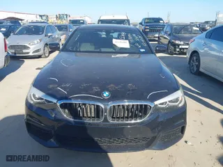 2019 BMW 5 Series 530e iPerformance with VIN WBAJA9C58KB393229, listed as a IAAI auction lot 41138496 with 87,121 mi miles. Bid and sale history available at carsss.com. Image 13.