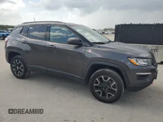 2019 Jeep Compass Trailhawk with VIN 3C4NJDDBXKT721356, listed as a Copart auction lot 60003045 with 164,864 mi miles and Clean title. Bid and sale history available at DreamBid. Image 4.