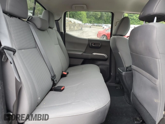 2021 Toyota Tacoma SR5 z VIN 3TYAZ5CN5MT004373, wystawiony jako Copart lot #58526145 z przebiegiem Nie podano mil oraz Szkoda całkowita • Salvage title. Historia ofert i sprzedaży dostępna na DreamBid. Obrazek 10.