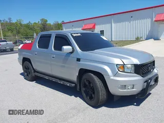 2012 Honda Ridgeline RTL with VIN 5FPYK1F5XCB452203, listed as a IAAI auction lot 41816014 with 147,647 mi miles. Bid and sale history available at carsss.com. Image 1.