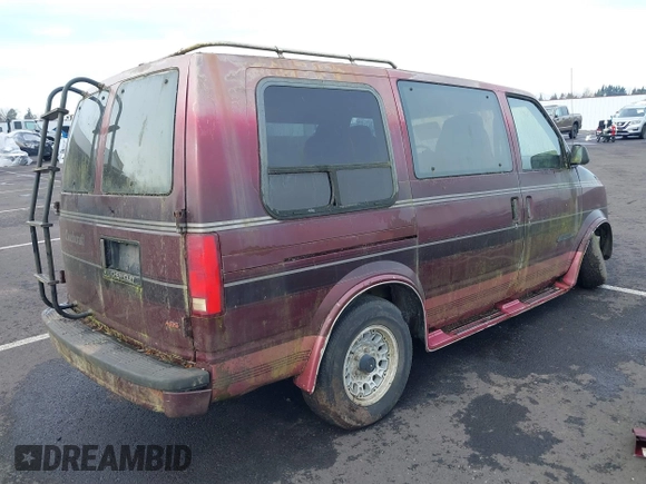 1991 Chevrolet Astro Cargo z VIN 1GBDM19Z4MB136076, wystawiony jako IAAI lot #41482281 z przebiegiem 202 682 mil mil oraz . Historia ofert i sprzedaży dostępna na DreamBid. Obrazek 4.