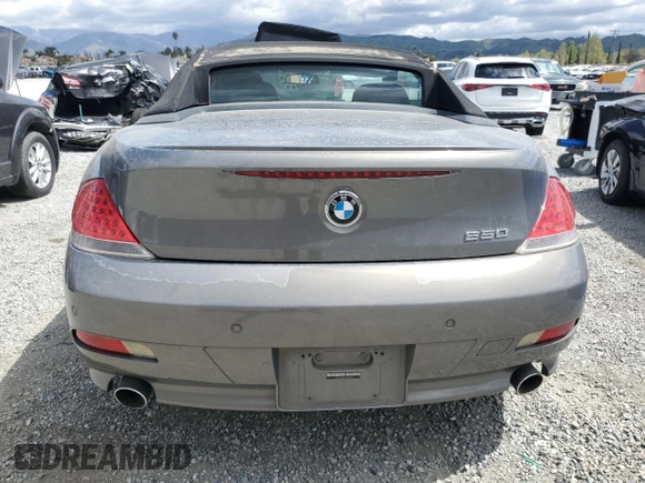 2007 BMW 6 Series 650i z VIN WBAEK13577CN81886, wystawiony jako Copart lot #51362585 z przebiegiem 110 174 mil mil oraz Czysty tytuł • Clean title. Historia ofert i sprzedaży dostępna na DreamBid. Obrazek 6.