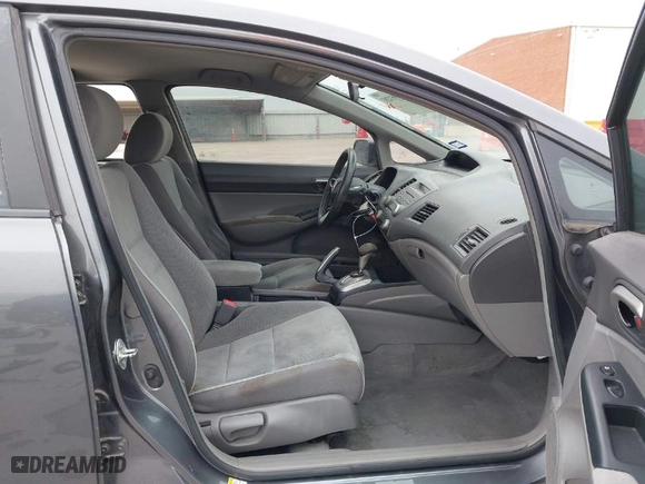 2010 Honda Civic Sdn LX with VIN 2HGFA1F59AH326975, listed as a IAAI auction lot 41953281 with 214,910 mi miles. Bid and sale history available at carsss.com. Image 5.