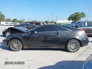 2012 Cadillac CTS Premium z VIN 1G6DP1E3XC0116593, wystawiony jako IAAI lot #42138575 z przebiegiem 198 884 mil mil oraz . Historia ofert i sprzedaży dostępna na DreamBid. Obrazek 14.