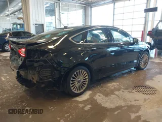 2014 Ford Fusion Titanium with VIN 3FA6P0K93ER115805, listed as a IAAI auction lot 41009602 with 136,021 mi miles. Bid and sale history available at carsss.com. Image 4.