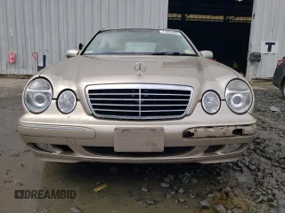 2001 Mercedes-Benz E-Class with VIN WDBJF65J01B389296, listed as a Copart auction lot 71933404 with 124,392 mi miles and Salvage Title. Bid and sale history available at carsss.com. Image 5.
