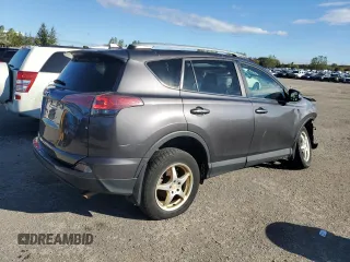 2016 Toyota RAV4 LE with VIN 2T3ZFREV3GW269727, listed as a Copart auction lot 74796814 with 235,242 mi miles and Salvage Title. Bid and sale history available at DreamBid. Image 3.