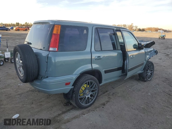 2000 Honda CR-V EX with VIN JHLRD1863YC006639, listed as a Copart auction lot 80442254 with 200,218 mi miles and Salvage Title. Bid and sale history available at carsss.com. Image 3.