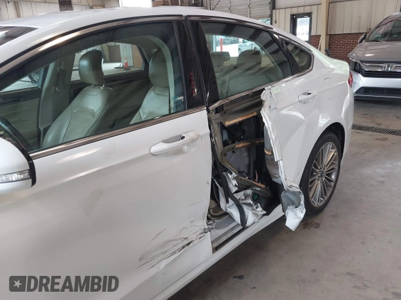 2014 Ford Fusion SE with VIN 3FA6P0HD8ER372731, listed as a IAAI auction lot 39915643 with 136,635 mi miles and . Bid and sale history available at DreamBid. Image 6.