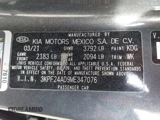 2021 Kia Forte LXS with VIN 3KPF24AD9ME347076, listed as a IAAI auction lot 42289157 with 59,095 mi miles and . Bid and sale history available at DreamBid. Image 9.