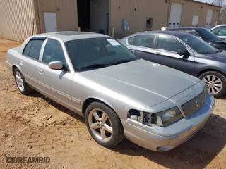 2004 Mercury Marauder with VIN 2MHHM79V74X675447, listed as a IAAI auction lot 41833704 with 244,849 mi miles. Bid and sale history available at carsss.com. Image 1.