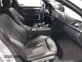 2016 BMW 4 Series 428i xDrive with VIN WBA4C9C5XGG138843, listed as a IAAI auction lot 41747358 with 63,804 mi miles and . Bid and sale history available at DreamBid. Image 5.