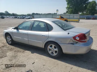 2004 Ford Taurus SE with VIN 1FAFP53U04G133586, listed as a Copart auction lot 59972925 with 228,938 mi miles and Salvage title. Bid and sale history available at DreamBid. Image 2.
