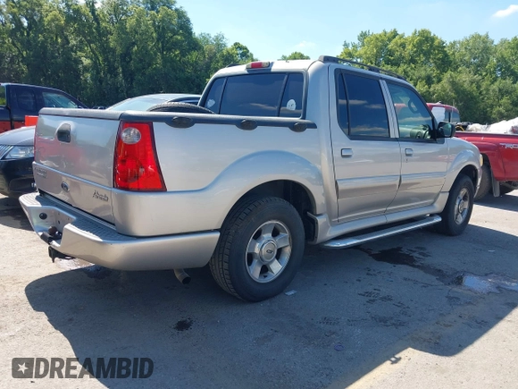 2005 Ford Explorer Sport Trac XLS z VIN 1FMZU67K25UB40598, wystawiony jako IAAI lot #42700021 z przebiegiem 201 596 mil mil oraz . Historia ofert i sprzedaży dostępna na DreamBid. Obrazek 4.