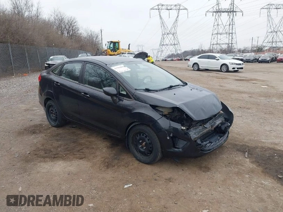 2012 Ford Fiesta S with VIN 3FADP4AJ8CM145208, listed as a IAAI auction lot 41784292 with 99,167 mi miles. Bid and sale history available at carsss.com. Image 1.
