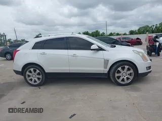 2014 Cadillac SRX Premium Collection with VIN 3GYFNDE31ES615995, listed as a IAAI auction lot 42148943 with 232,752 mi miles and . Bid and sale history available at DreamBid. Image 13.