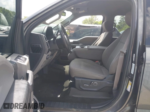2018 Ford F-150 XL with VIN 1FTEW1E57JFA95086, listed as a IAAI auction lot 42574704 with 77,301 mi miles and . Bid and sale history available at DreamBid. Image 5.