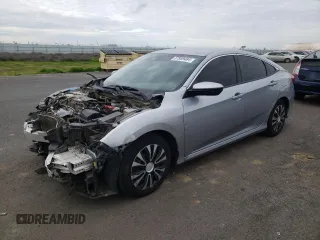 2019 Honda Civic Sedan LX with VIN 19XFC2F61KE200100, listed as a Copart auction lot 37959484 with 131,847 mi miles and Salvage Title. Bid and sale history available at carsss.com. Image 1.