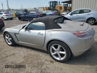2009 Saturn Sky z VIN 1G8MN35B69Y101096, wystawiony jako Copart lot #68100674 z przebiegiem 37 005 mil mil oraz Tytuł czysty. Historia ofert i sprzedaży dostępna na DreamBid. Obrazek 2.