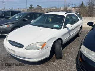 2003 Ford Taurus SE Standard z VIN 1FAFP58283A155067, wystawiony jako Copart lot #54555045 z przebiegiem 159 296 mil mil oraz Tytuł czysty. Historia ofert i sprzedaży dostępna na DreamBid. Obrazek 2.