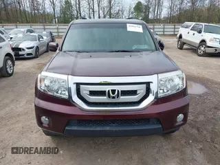 2009 Honda Pilot EX-L with VIN 5FNYF486X9B026041, listed as a IAAI auction lot 41942718 with 219,301 mi miles and . Bid and sale history available at carsss.com. Image 6.