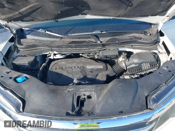 2016 Honda Pilot EX-L with VIN 5FNYF5H5XGB016152, listed as a IAAI auction lot 41820023 with 210,474 mi miles and . Bid and sale history available at DreamBid. Image 10.