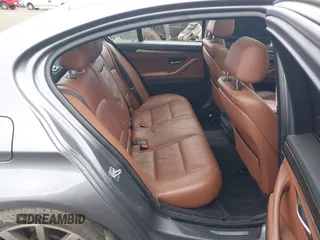 2014 BMW 5 Series 535i with VIN WBA5B1C51ED475098, listed as a IAAI auction lot 41517762 with 102,611 mi miles and . Bid and sale history available at carsss.com. Image 8.