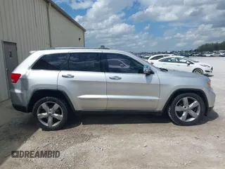 2012 Jeep Grand Cherokee Overland with VIN 1C4RJECTXCC317018, listed as a IAAI auction lot 41975933 with 191,043 mi miles. Bid and sale history available at carsss.com. Image 13.