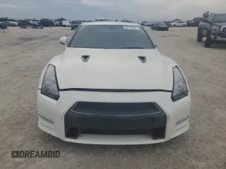 2015 Nissan GT-R Premium z VIN JN1AR5EF5FM281737, wystawiony jako Copart lot #80119804 z przebiegiem 50 726 mil mil oraz Szkody całkowita. Historia ofert i sprzedaży dostępna na DreamBid. Obrazek 5.