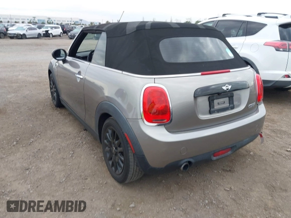 2016 MINI Convertible z VIN WMWWG5C51G3A81075, wystawiony jako IAAI lot #41681717 z przebiegiem 54 956 mil mil oraz . Historia ofert i sprzedaży dostępna na DreamBid. Obrazek 3.