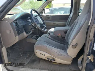 2003 Dodge Dakota SLT z VIN 1D7HL42N33S237980, wystawiony jako Copart lot #55276095 z przebiegiem 97 471 mil mil oraz Tytuł czysty. Historia ofert i sprzedaży dostępna na DreamBid. Obrazek 7.