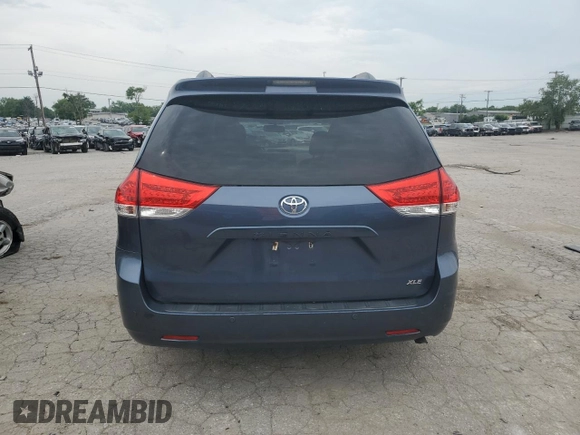 2014 Toyota Sienna XLE with VIN 5TDYK3DC2ES520840, listed as a Copart auction lot 59672295 with 194,143 mi miles and Salvage title. Bid and sale history available at DreamBid. Image 6.