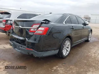 2013 Ford Taurus Limited with VIN 1FAHP2F84DG106350, listed as a IAAI auction lot 41833203 with 195,548 mi miles. Bid and sale history available at carsss.com. Image 4.