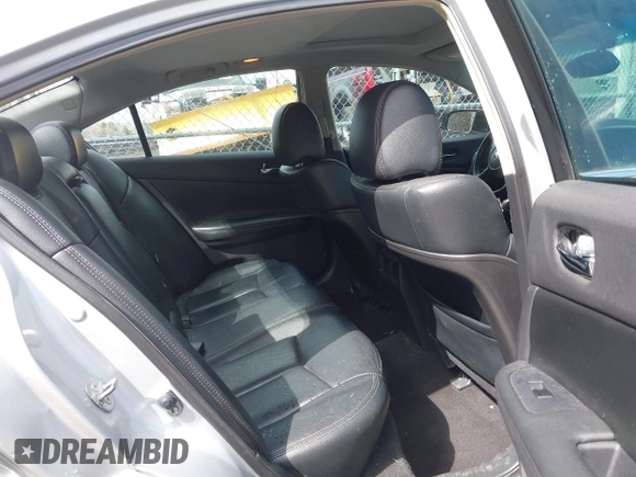 2013 Nissan Maxima S with VIN 1N4AA5AP0DC838596, listed as a IAAI auction lot 41992360 with 117,096 mi miles and . Bid and sale history available at DreamBid. Image 8.