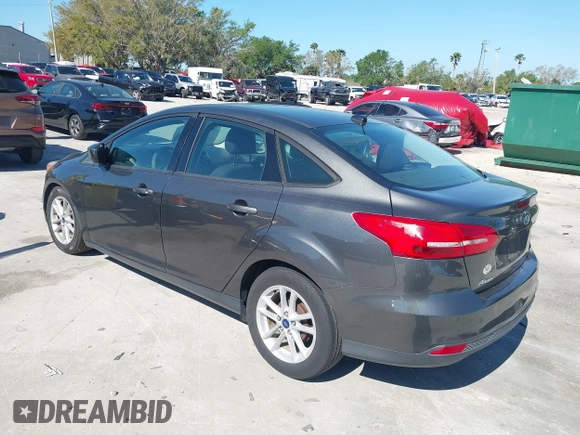 2018 Ford Focus SE z VIN 1FADP3F27JL245603, wystawiony jako IAAI lot #41773395 z przebiegiem 94 044 mil mil oraz . Historia ofert i sprzedaży dostępna na DreamBid. Obrazek 3.