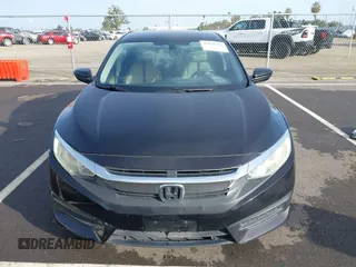 2016 Honda Civic Sedan LX with VIN 19XFC2F54GE221926, listed as a IAAI auction lot 41830703 with 205,848 mi miles. Bid and sale history available at carsss.com. Image 12.