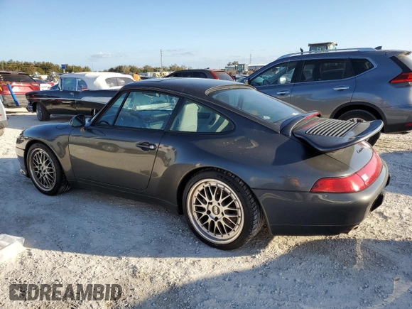 1995 Porsche 911 Carrera with VIN WP0AA2994SS323280, listed as a Copart auction lot 75304104 with 105,675 mi miles and Salvage Title. Bid and sale history available at carsss.com. Image 2.