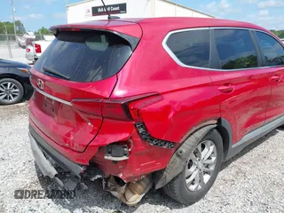 2019 Hyundai Santa Fe SE z VIN 5NMS23AD8KH025141, wystawiony jako IAAI lot #42209919 z przebiegiem 176 172 mil mil oraz . Historia ofert i sprzedaży dostępna na DreamBid. Obrazek 6.