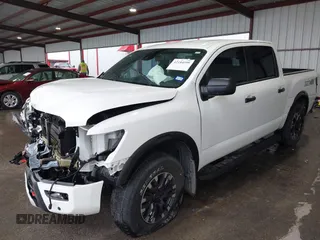 2021 Nissan Titan Pro-4X z VIN 1N6AA1ED7MN511004, wystawiony jako IAAI lot #42184599 z przebiegiem 36 086 mil mil oraz . Historia ofert i sprzedaży dostępna na DreamBid. Obrazek 18.
