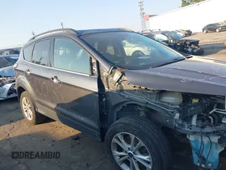 2018 Ford Escape SEL with VIN 1FMCU9HD0JUC25036, listed as a IAAI auction lot 40518589 with 143,076 mi miles. Bid and sale history available at carsss.com. Image 13.