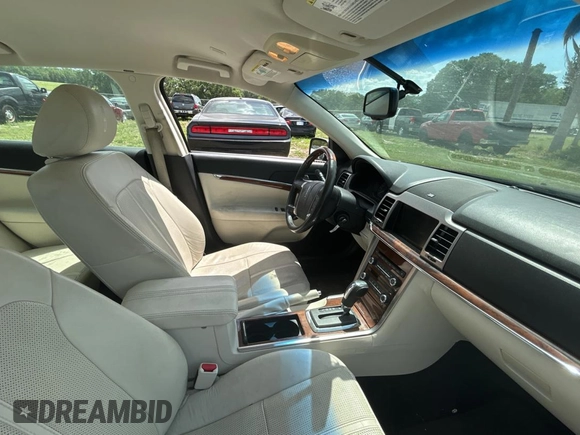 2011 Lincoln MKZ Hybrid with VIN 3LNDL2L33BR759329, listed as a Copart auction lot 51872235 with 131,927 mi miles and Clean Title. Bid and sale history available at carsss.com. Image 5.