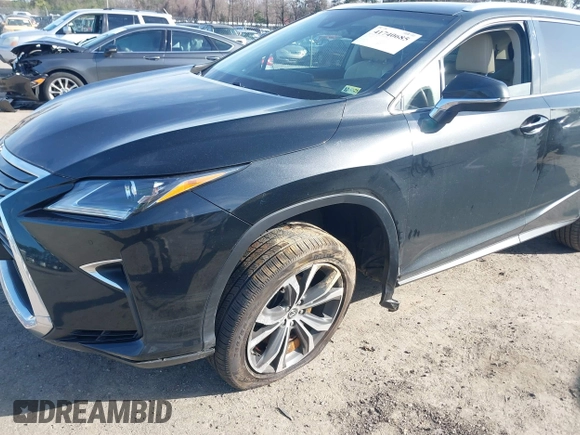 2018 Lexus RX 350L Premium z VIN JTJDZKCA8J2005182, wystawiony jako IAAI lot #41740685 z przebiegiem 113 405 mil mil oraz . Historia ofert i sprzedaży dostępna na DreamBid. Obrazek 6.