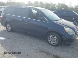 2005 Honda Odyssey EX with VIN 5FNRL38455B135555, listed as a IAAI auction lot 42080079 with 149,468 mi miles and . Bid and sale history available at carsss.com. Image 1.