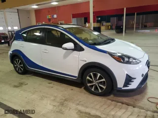2018 Toyota Prius c One with VIN JTDKDTB39J1615373, listed as a Copart auction lot 52892405 with 84,514 mi miles and Clean Title. Bid and sale history available at carsss.com. Image 4.