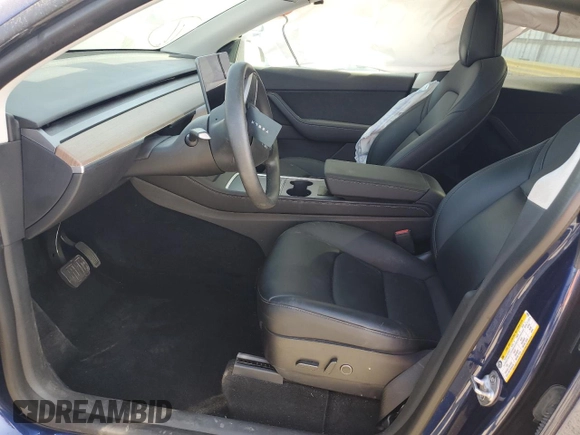 2022 Tesla Model Y Long Range z VIN 7SAYGDEE4NF408202, wystawiony jako Copart lot #51790905 z przebiegiem 43 509 mil mil oraz Szkody całkowita. Historia ofert i sprzedaży dostępna na DreamBid. Obrazek 7.