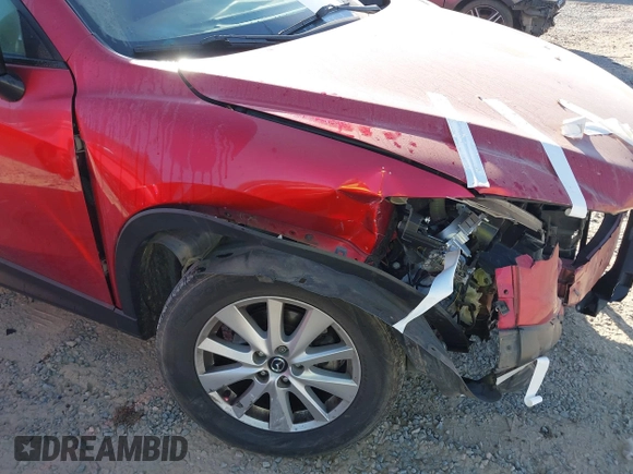 2015 Mazda CX-5 Touring with VIN JM3KE4CY6F0455468, listed as a IAAI auction lot 40669780 with 225,831 mi miles and . Bid and sale history available at carsss.com. Image 6.