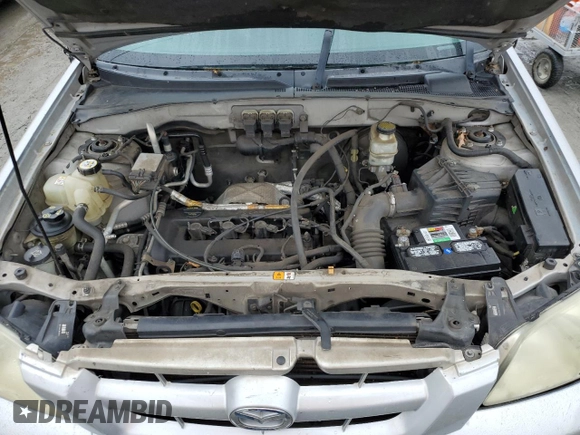 2006 Mazda Tribute i with VIN 4F2YZ02Z26KM14821, listed as a Copart auction lot 71718434 with 318,841 mi miles and Salvage Title. Bid and sale history available at carsss.com. Image 13.